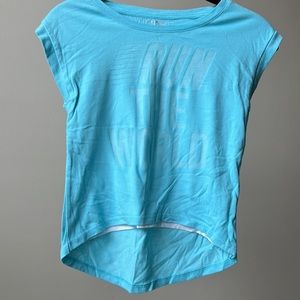 Girls size 7/8 light blue run the world shirt sleeve tee